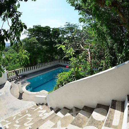 Jardin Etnobotanico Villa Ludovica Santa Marta  Bilik gambar